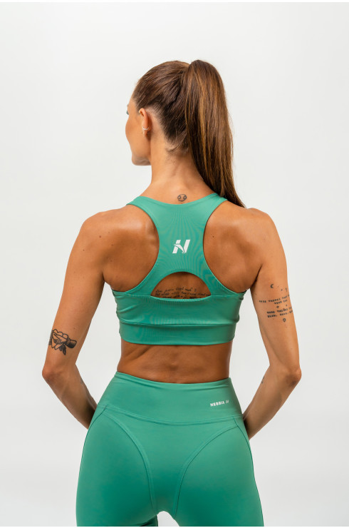 Nebbia WOMENS - Medium support sports bra - green 